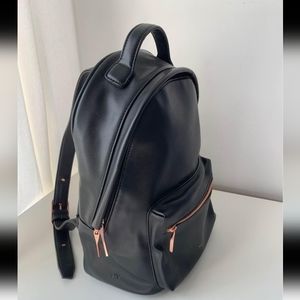Like new Matt and Nat Black and rose gold backpack